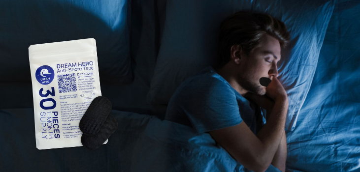 Man sleeping using DeramHero Mouth Tape and a sachet of mouth tapes next to him