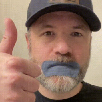 Man with mouth tape on